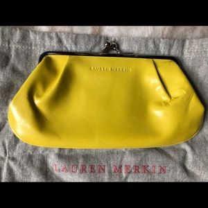 Small, yellow Lauren Merkin clutch with dust bag